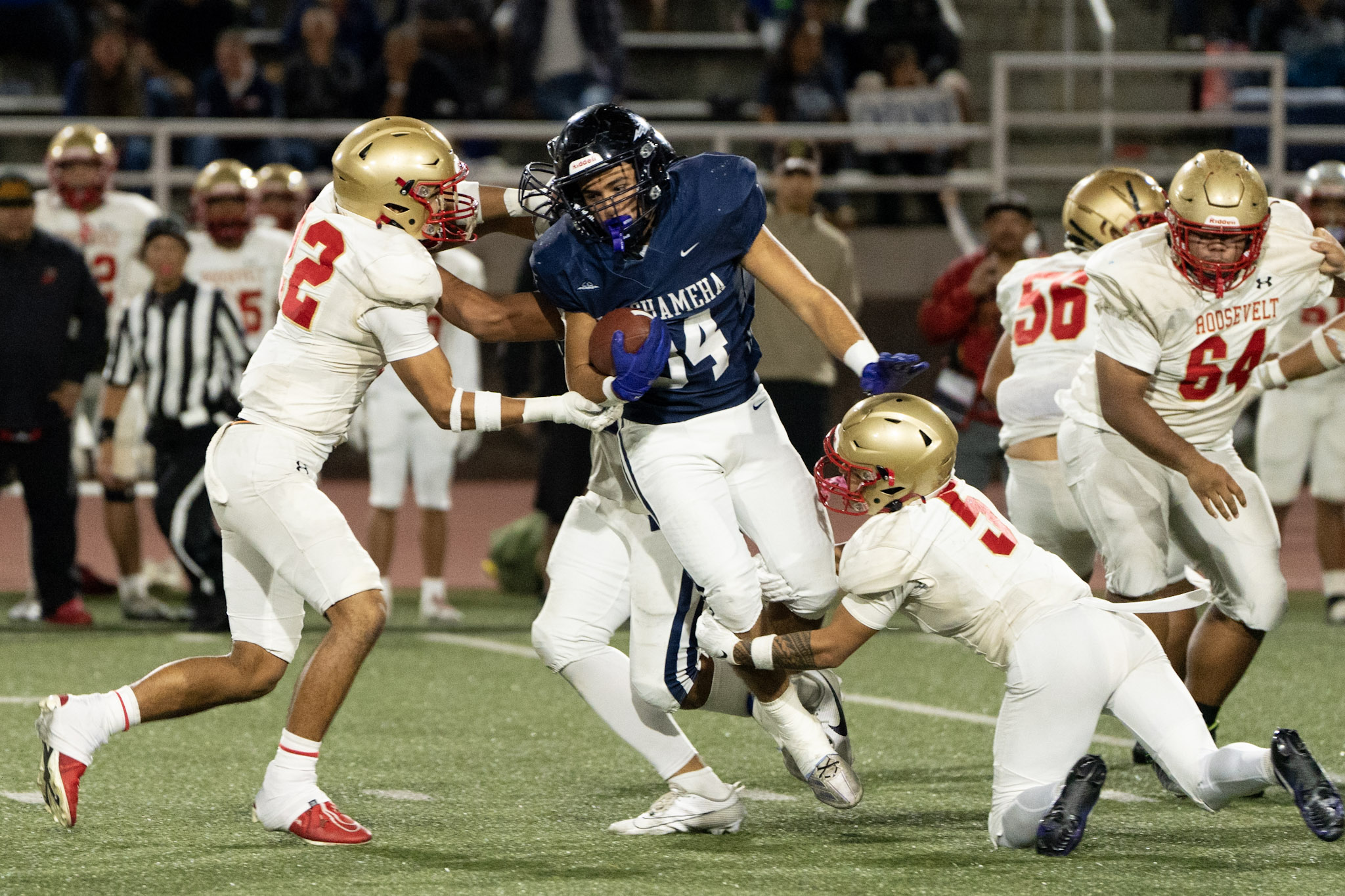 Kamehameha Maui's Kaikea Hu'eu runs in the first half against Roosevelt. The top-seeded Warriors won the game 60-26 on Saturday to advance to the Division II state championship game this week. Hu'eu finished with a game-high 124 yards rushing. Photo courtesy Kamehameha Schools Maui