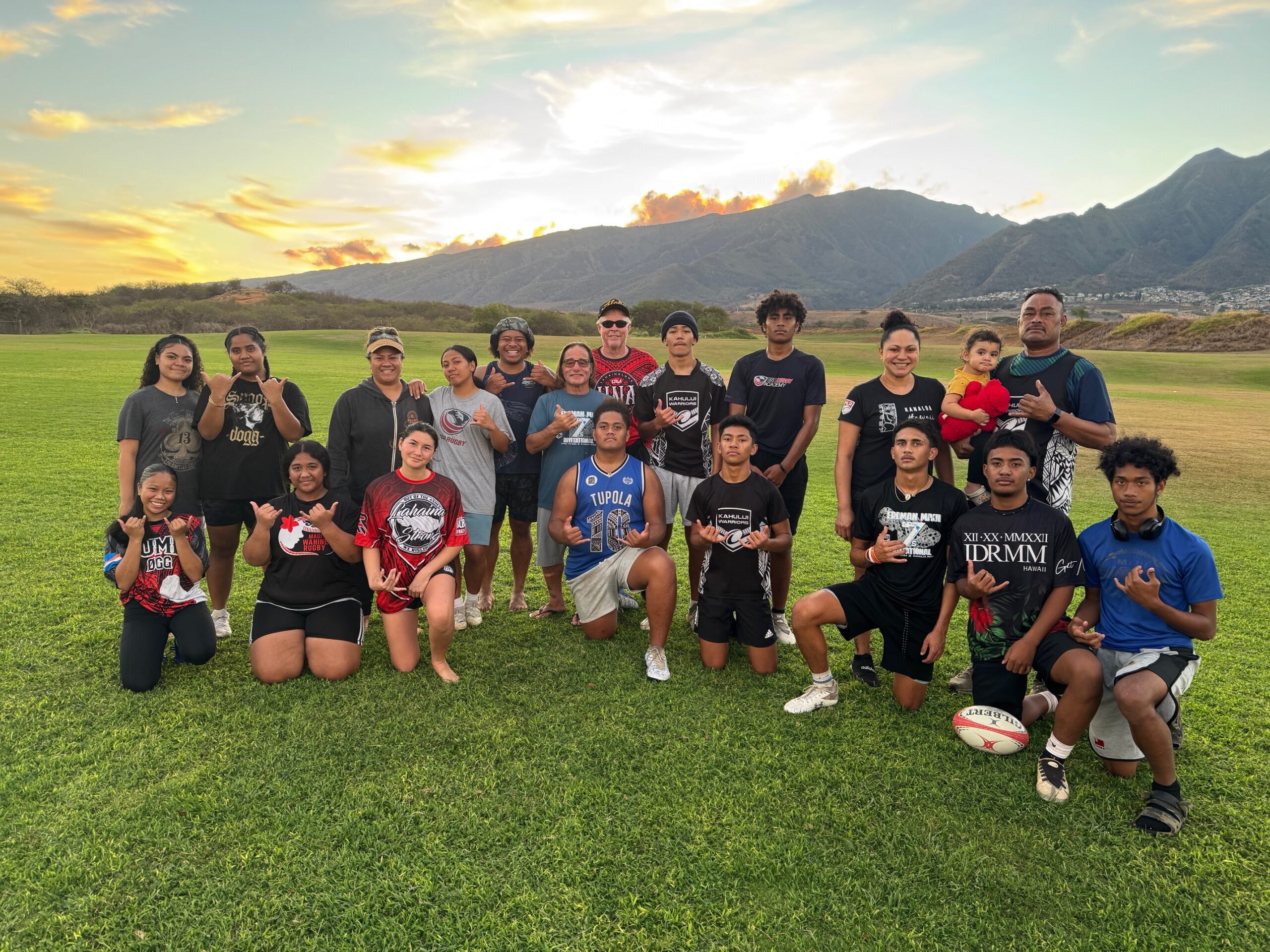 Members of the Maui Rugby Union U18 boys and several supporters posed for this team photo at practice on Tuesday. MRU president Siua Lolohea is on the far right in the second row. HJI / ROB COLLIAS photo