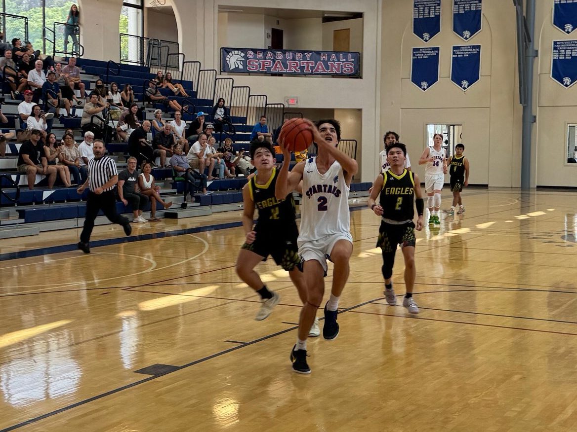 Seabury Hall's Bromo Dorn drives to the basket at the Erdman Athletic Center on Saturday. Dorn scored 25 points in a 63-37 win over Hawaii Baptist Academy. HJI / ROB COLLIAS photo