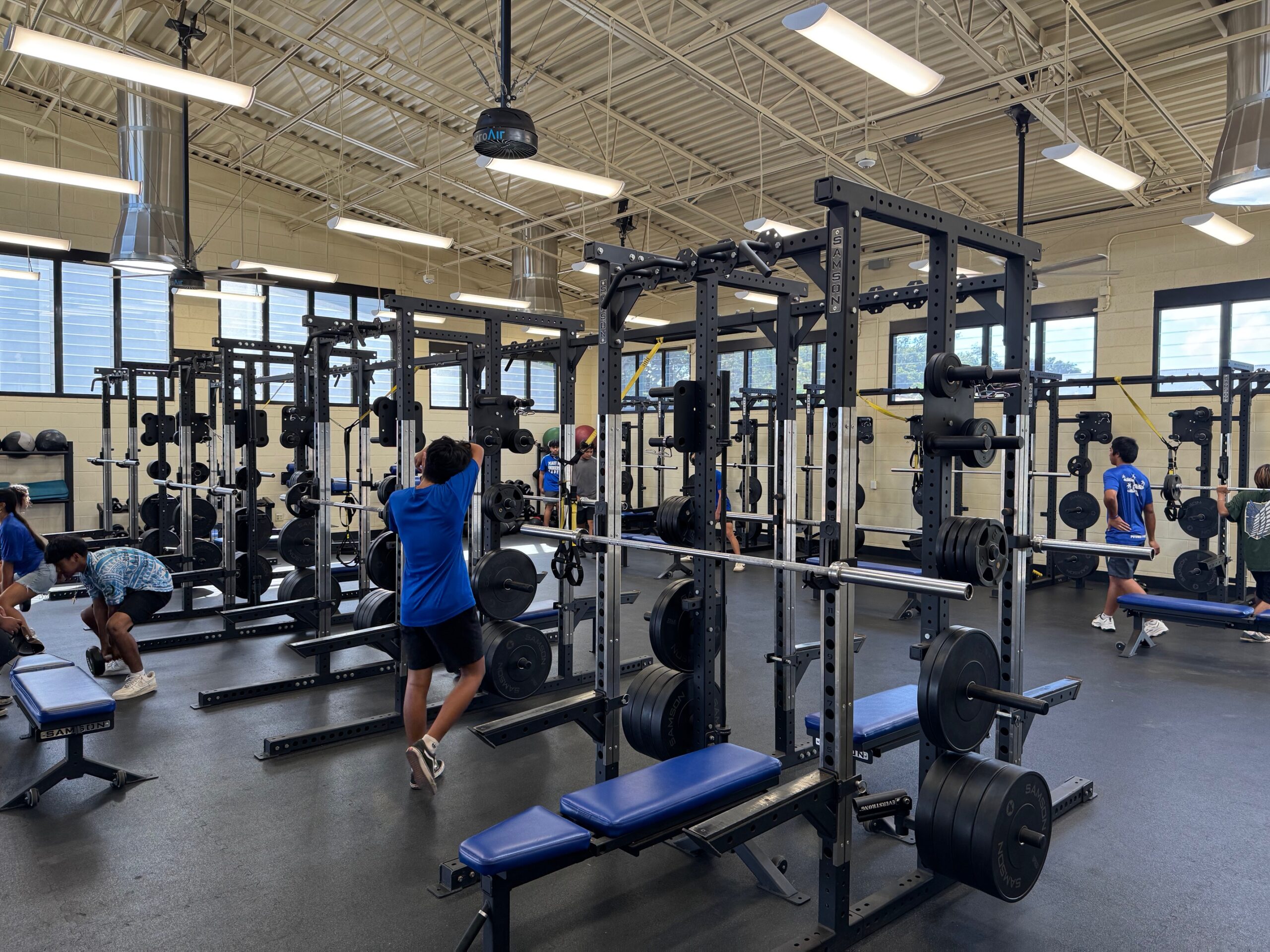 Student athletes use the Maui High School weight room on Tueasday afternoon. The weight room is part of a $5 million building that opened in 2022. HJI / ROB COLLIAS photo